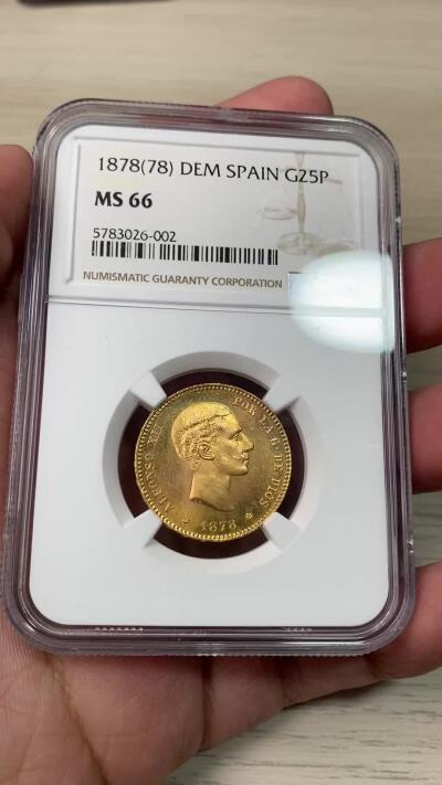 万国钱币拍卖第059期 NGC MS66 1878西班牙阿方索十二世25比塞塔金币 大量进入流通的西班牙金币品种 GEM级别可谓难得一见 丝绸金光类镜面质感 肉眼无暇状态 堪称完美的顶级典藏品质 8.06g 900金