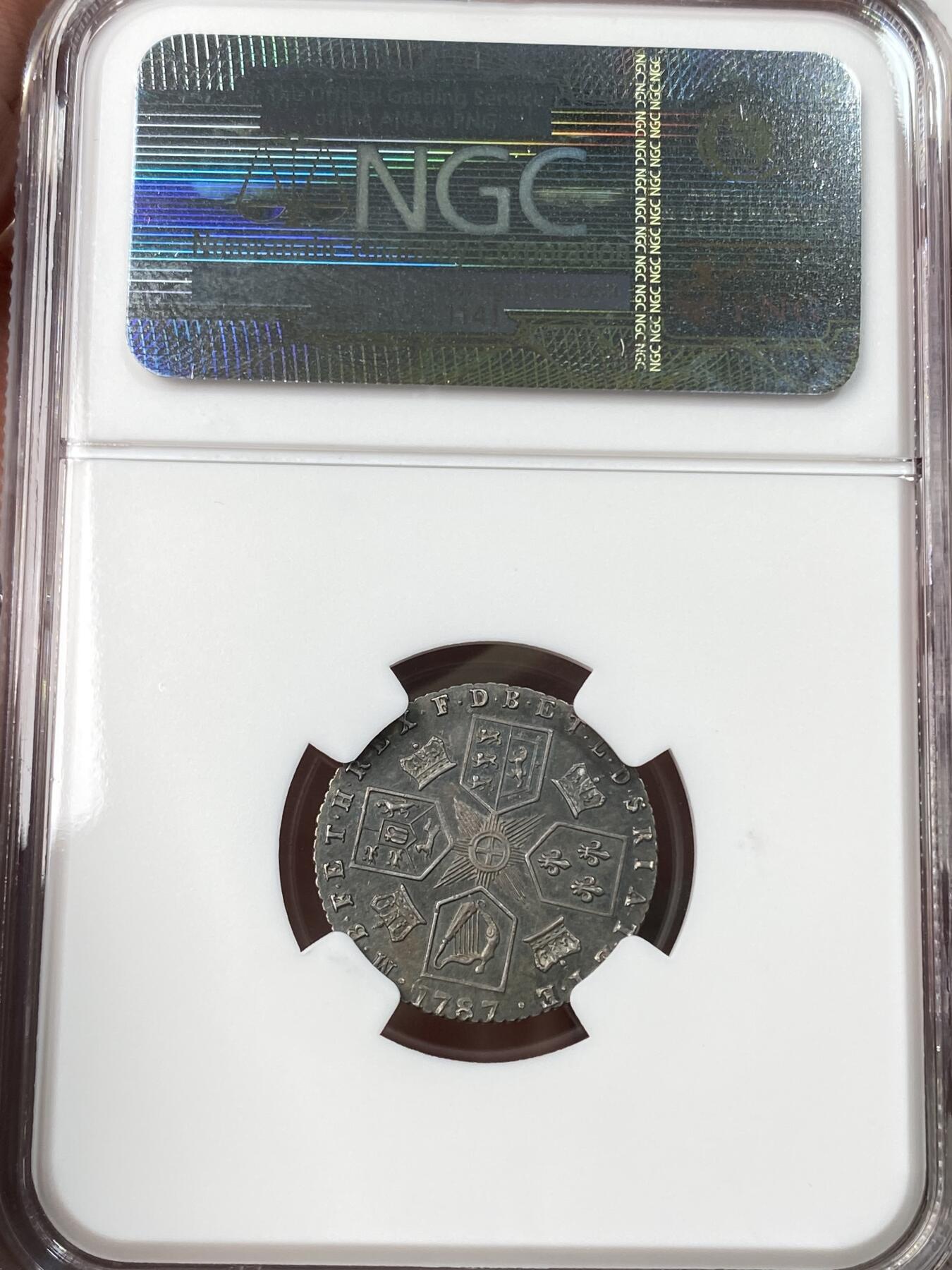 万国钱币拍卖第059期 NGC MS64 1786年英国乔治三世6便士银币 顶级大不列颠天鹅绒孔雀蓝彩极美收藏级