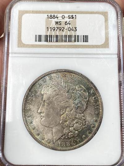 万国钱币拍卖第059期 - NGC MS64 1884年O版美国摩根一美元大银币 经典NGC老盒五彩收藏级