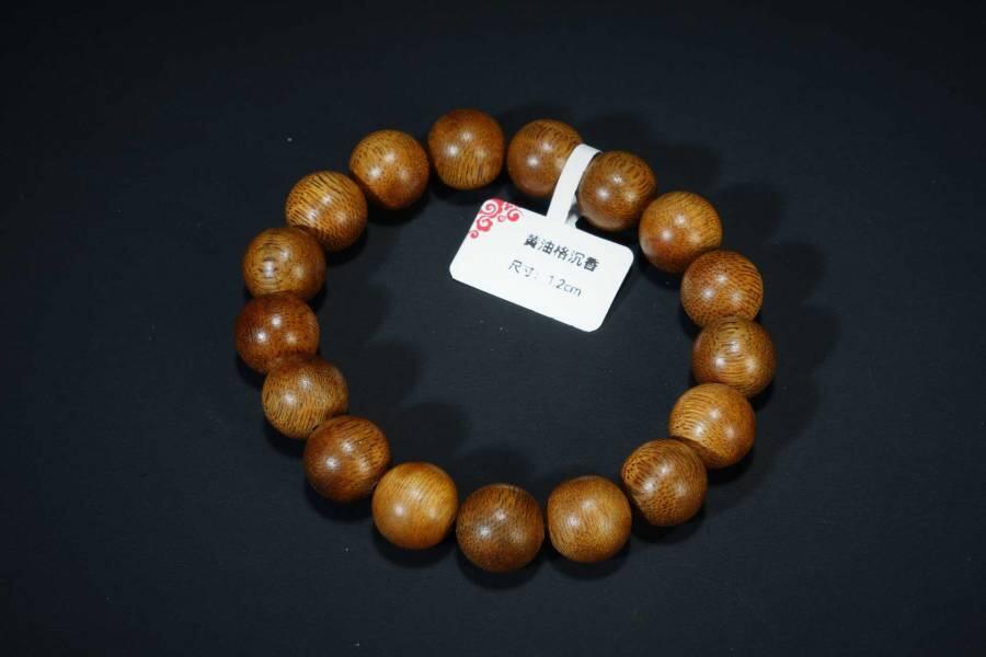 上海都达杂项专场十七（全场包邮） 天然黄油格沉香1.2圆珠手串 附鉴定证书87-208