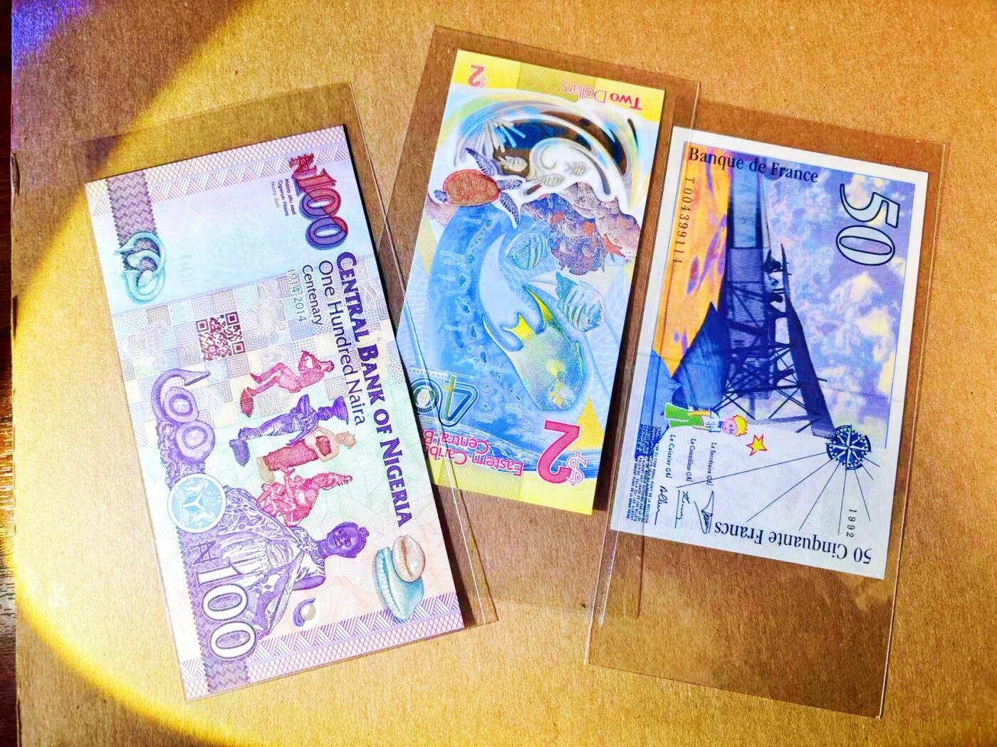 【Blue Auction】世界纸币精拍第778期——18级TOP拍卖/信誉/品质/专业/高效💫 【一组3张 含AA冠获奖钞无47】东加勒比 2024年2元&法国 1992年首年50法郎小王子&尼日利亚 2014年100奈拉 全新UNC