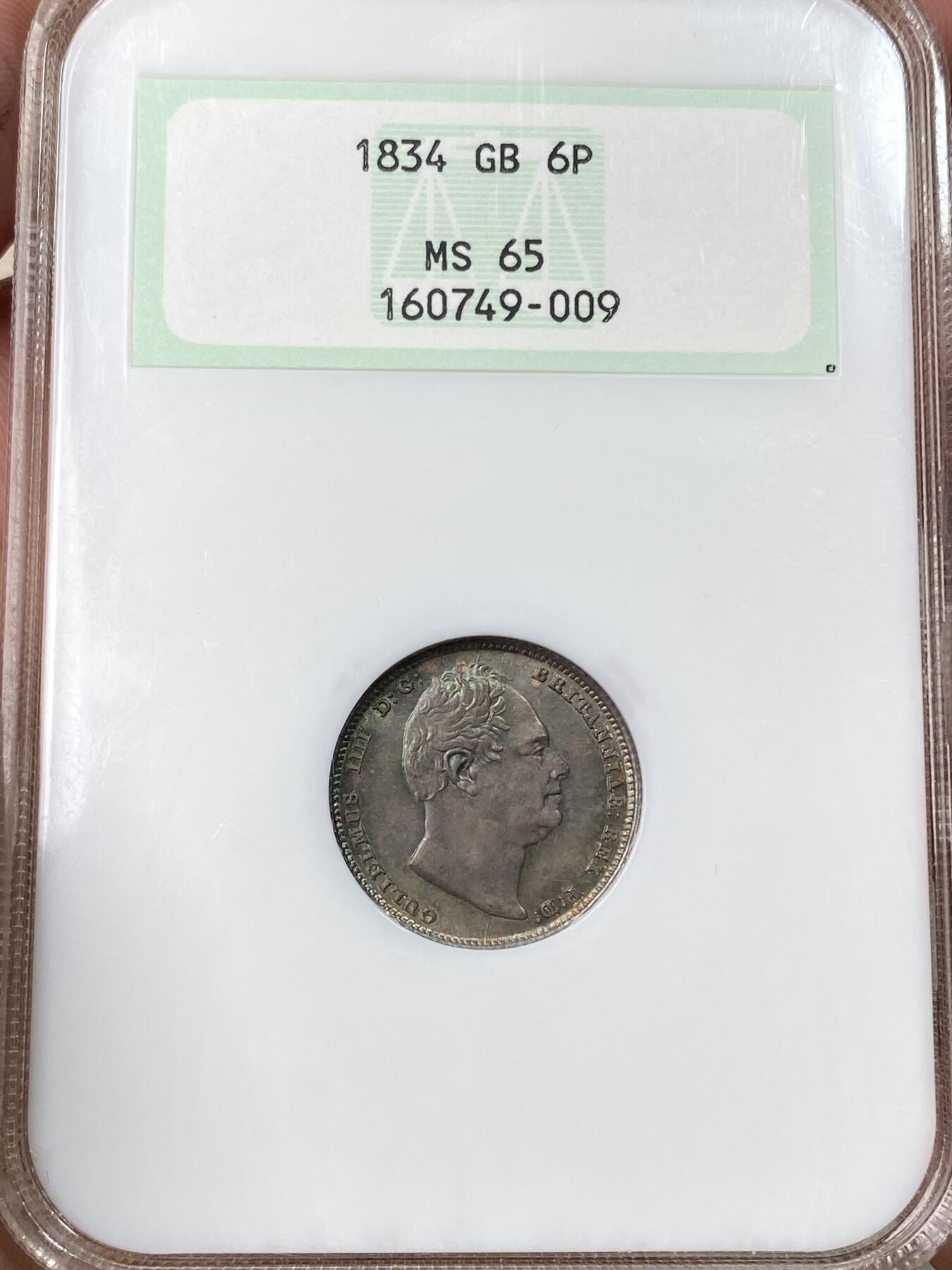 万国钱币拍卖第059期 NGC MS65 1834年英国威廉四世6便士银币 NGC古董绿盒搭配绝美天鹅绒绿彩包浆 无可挑剔的BU品质