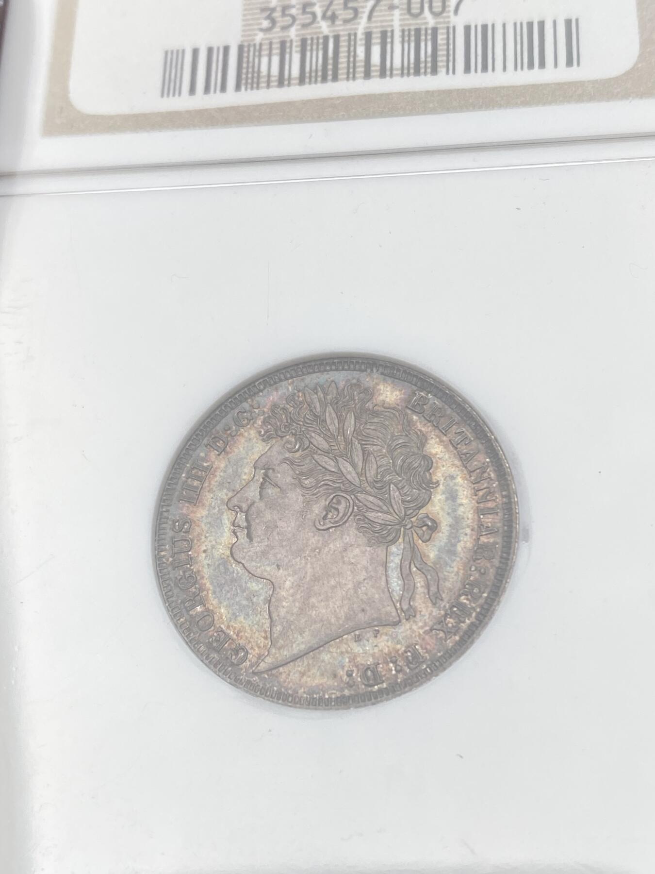 万国钱币拍卖第059期 NGC MS64 1824年英国乔治四世嘉德1先令银币 原味英式天鹅绒七色浓郁包浆 NGC老白盒难得收藏品质