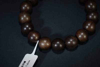 上海都达杂项专场六（全场包邮） 天然文莱软丝沉香1.2圆珠手串 附鉴定证书87-214