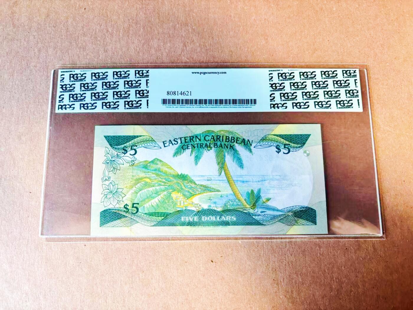 【Blue Auction】世界纸币精拍第778期——18级TOP拍卖/信誉/品质/专业/高效💫 东加勒比 1986-88年5元 女王 小彩背 PCGS66EPQ 