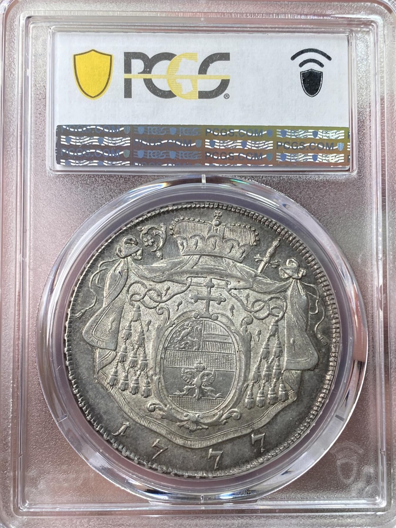 万国钱币拍卖第059期 PCGS AU58 1777年神圣罗马帝国萨尔茨堡教区亲王大主教希罗尼穆斯纹章大泰勒 萨尔茨堡造币厂铸 原味深打欧陆黑包浆极美