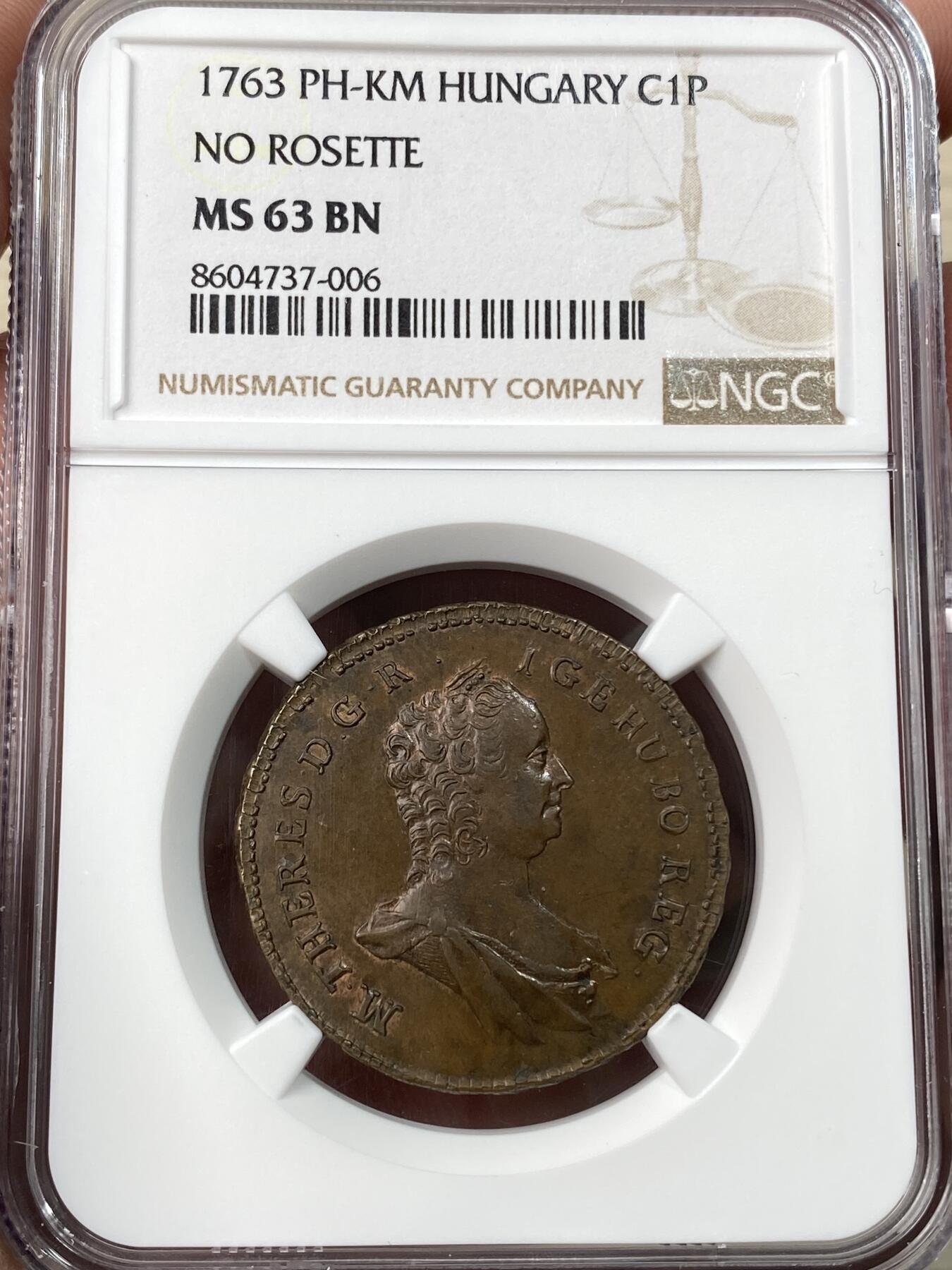 万国钱币拍卖第059期 NGC MS63 1763神圣罗马帝国匈牙利玛利亚特蕾莎圣母抱婴1P铜币 好品非常罕见的神罗辅币品种 原味巧克力包浆 NGC唯二冠军分 