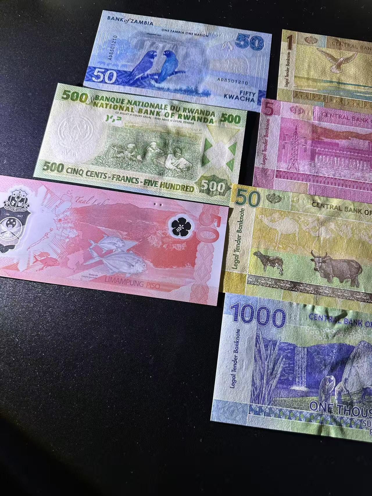 《外钞收藏家》第六百零四期（精品场）（本平台长期征集拍品、欢迎藏友们联系合作） 苏丹1-1000镑8张+赞比亚50+卢旺达500+菲律宾50比索AA靓号 3张一起 全新UNC