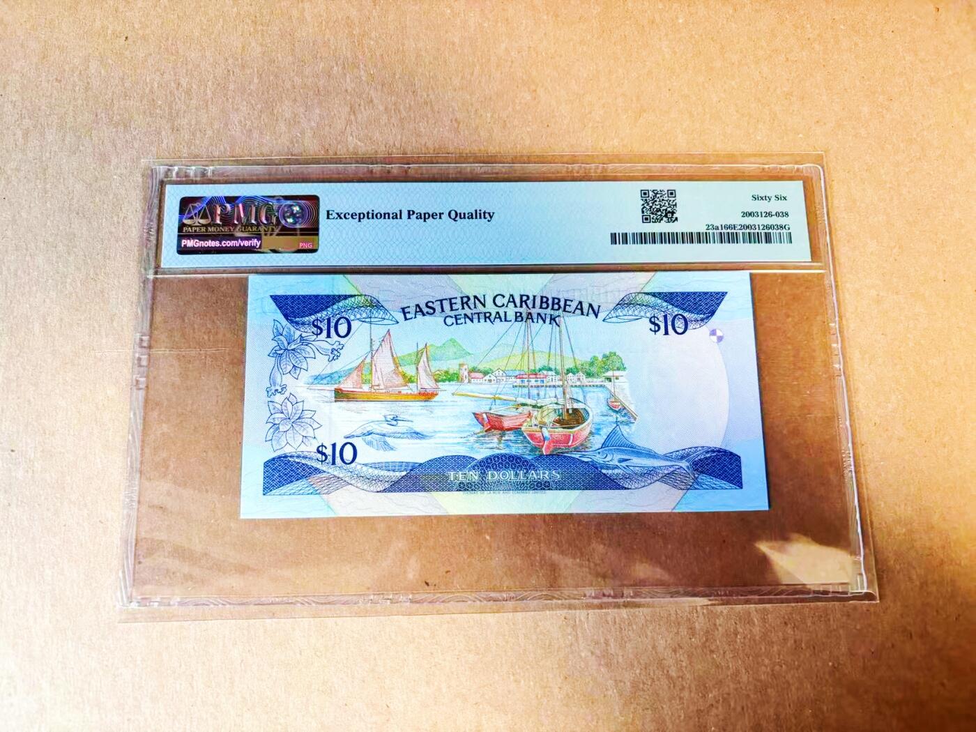 【Blue Auction】世界纸币精拍第778期——18级TOP拍卖/信誉/品质/专业/高效💫 【无47】东加勒比 1985-93年10元 女王 小彩背 PMG66EPQ 