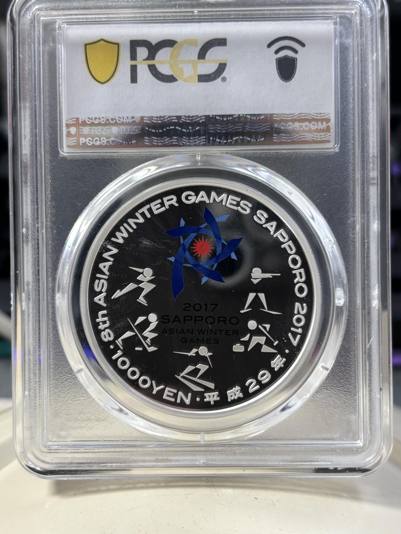 第189期拍卖 日本2017第8届冬季亚运会1000日元1盎司彩银币PCGS-PR68原盒证书，999银