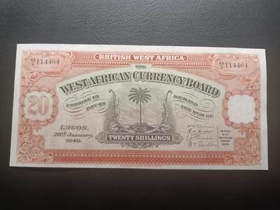 2026一月第四期，总214期 - 英属西非1949年20先令AUNC首冠AA，稀有的英属西非时期中高面值，正面是椰树图案，背面是阿拉伯文的面值