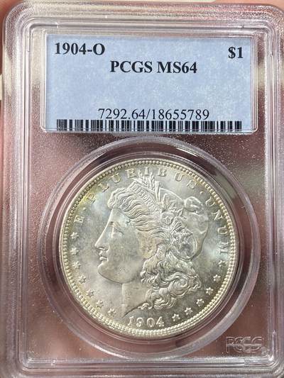 万国钱币拍卖第059期 - PCGS MS64 1904年O版美国摩根一美元大银 原味淡彩丝绸转光