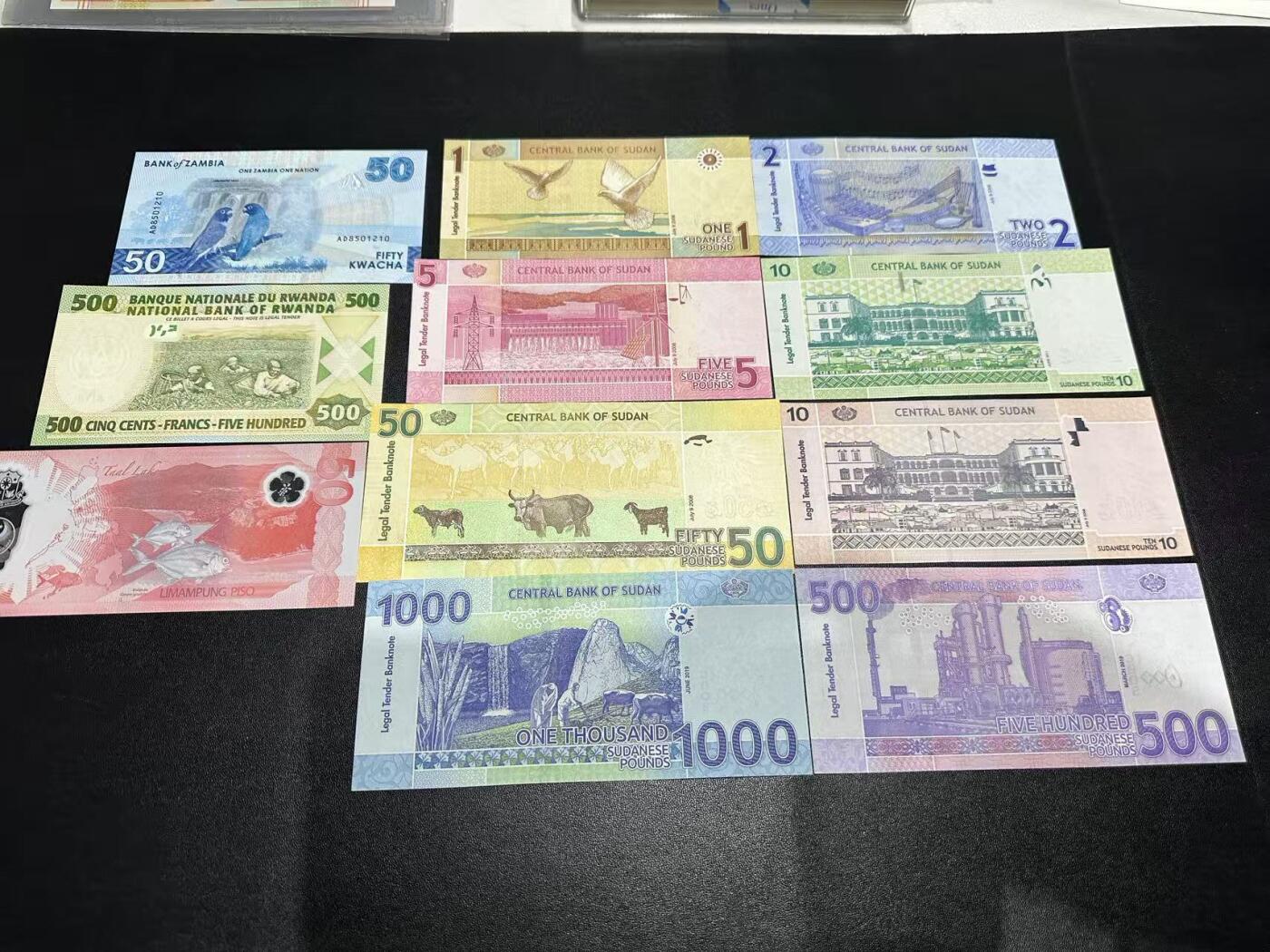 《外钞收藏家》第六百零四期（精品场）（本平台长期征集拍品、欢迎藏友们联系合作） 苏丹1-1000镑8张+赞比亚50+卢旺达500+菲律宾50比索AA靓号 3张一起 全新UNC