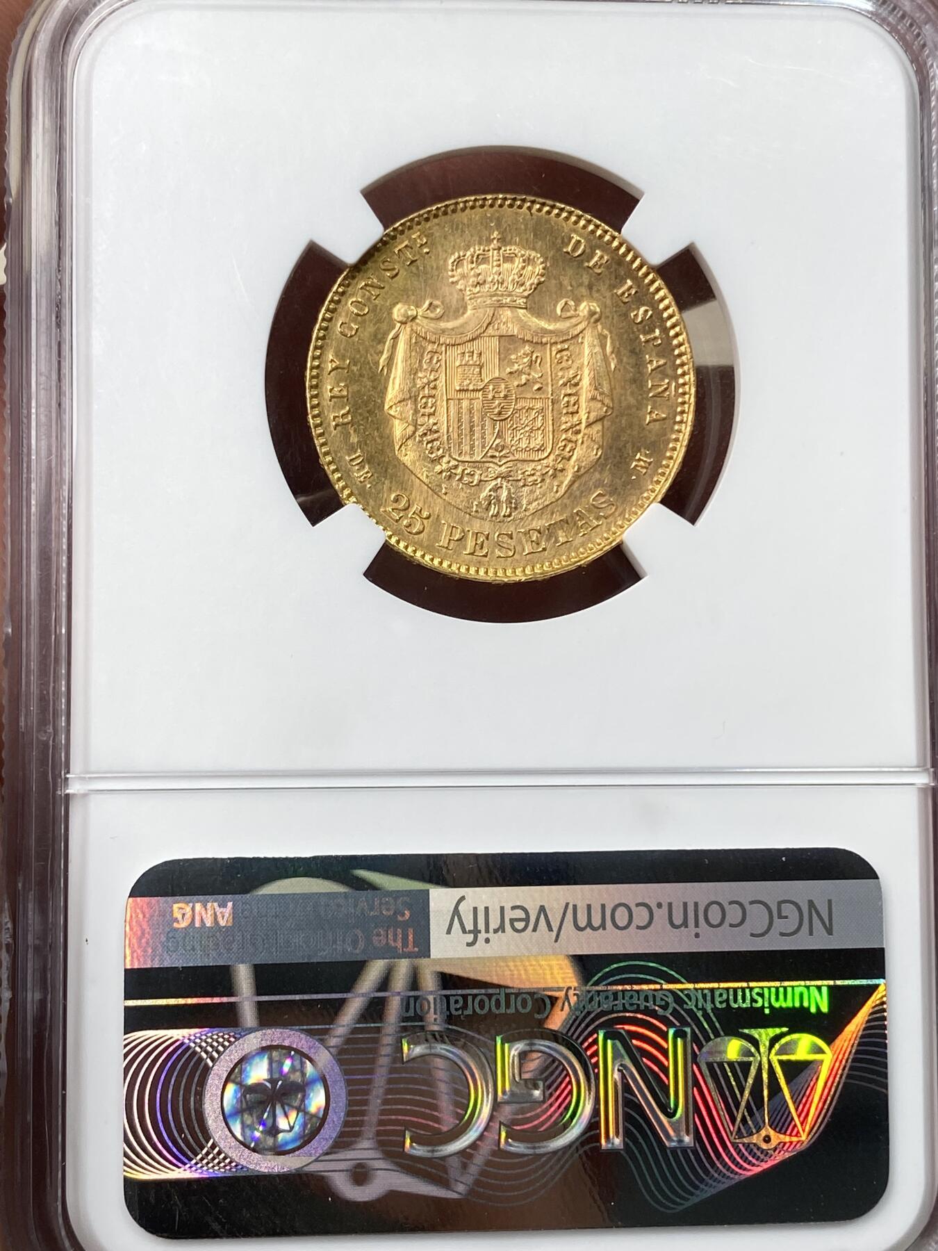 万国钱币拍卖第059期 NGC MS66 1878西班牙阿方索十二世25比塞塔金币 大量进入流通的西班牙金币品种 GEM级别可谓难得一见 丝绸金光类镜面质感 肉眼无暇状态 堪称完美的顶级典藏品质 8.06g 900金