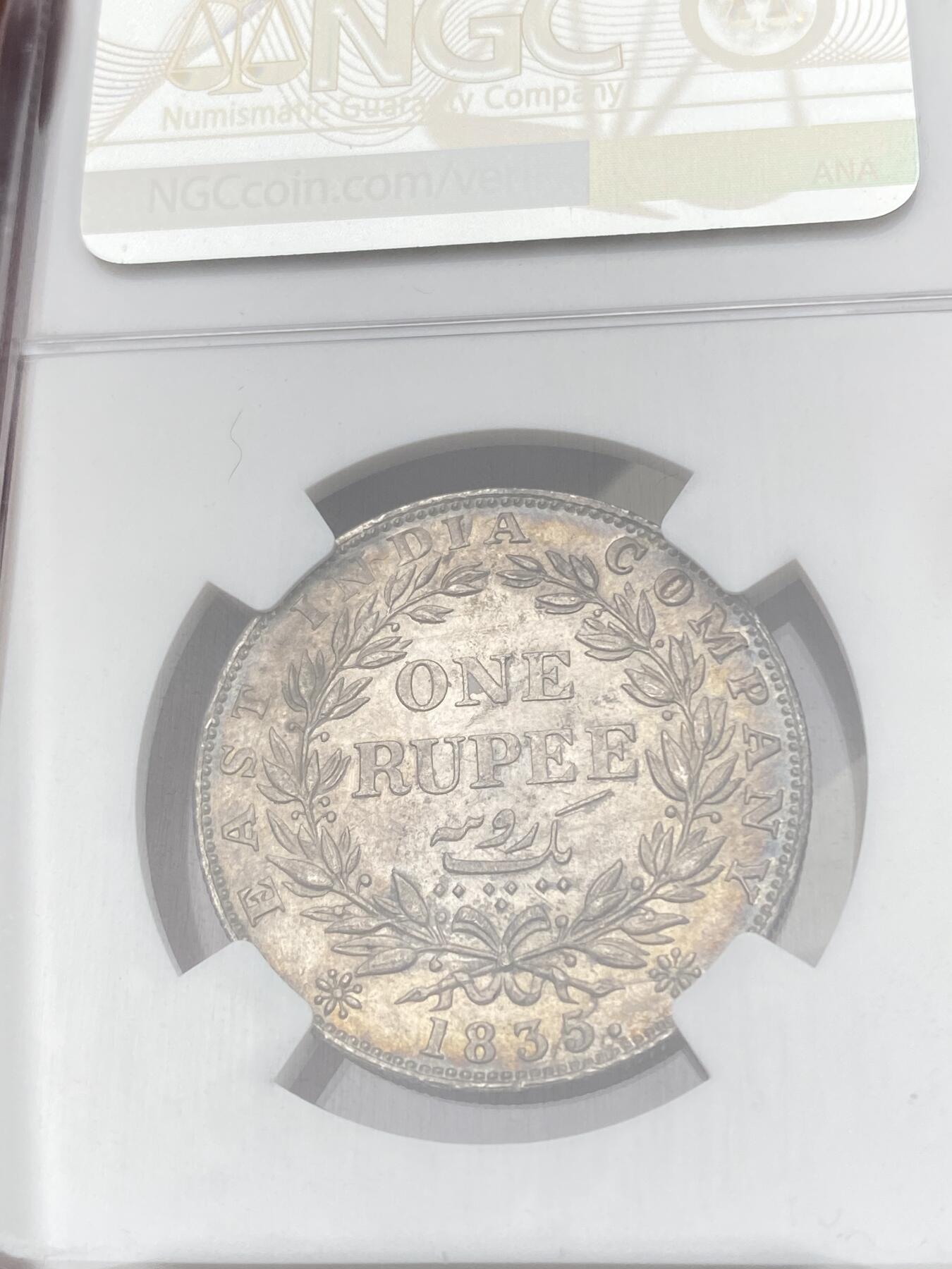 万国钱币拍卖第059期 NGC MS64 1835年英属印度威廉四世1卢比银币 原味金彩转光收藏级品质 高分飞涨品种 25年8月HA同分成交价3600美金