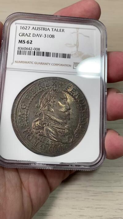 万国钱币拍卖第059期 NGC MS62 1627年神圣罗马帝国费迪南德二世纹章大泰勒 近400年历史的神罗大银 醇厚均匀玫瑰红色包浆极致美丽 全深打顶级收藏品质