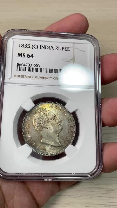 万国钱币拍卖第059期 NGC MS64 1835年英属印度威廉四世1卢比银币 原味金彩转光收藏级品质 高分飞涨品种 25年8月HA同分成交价3600美金