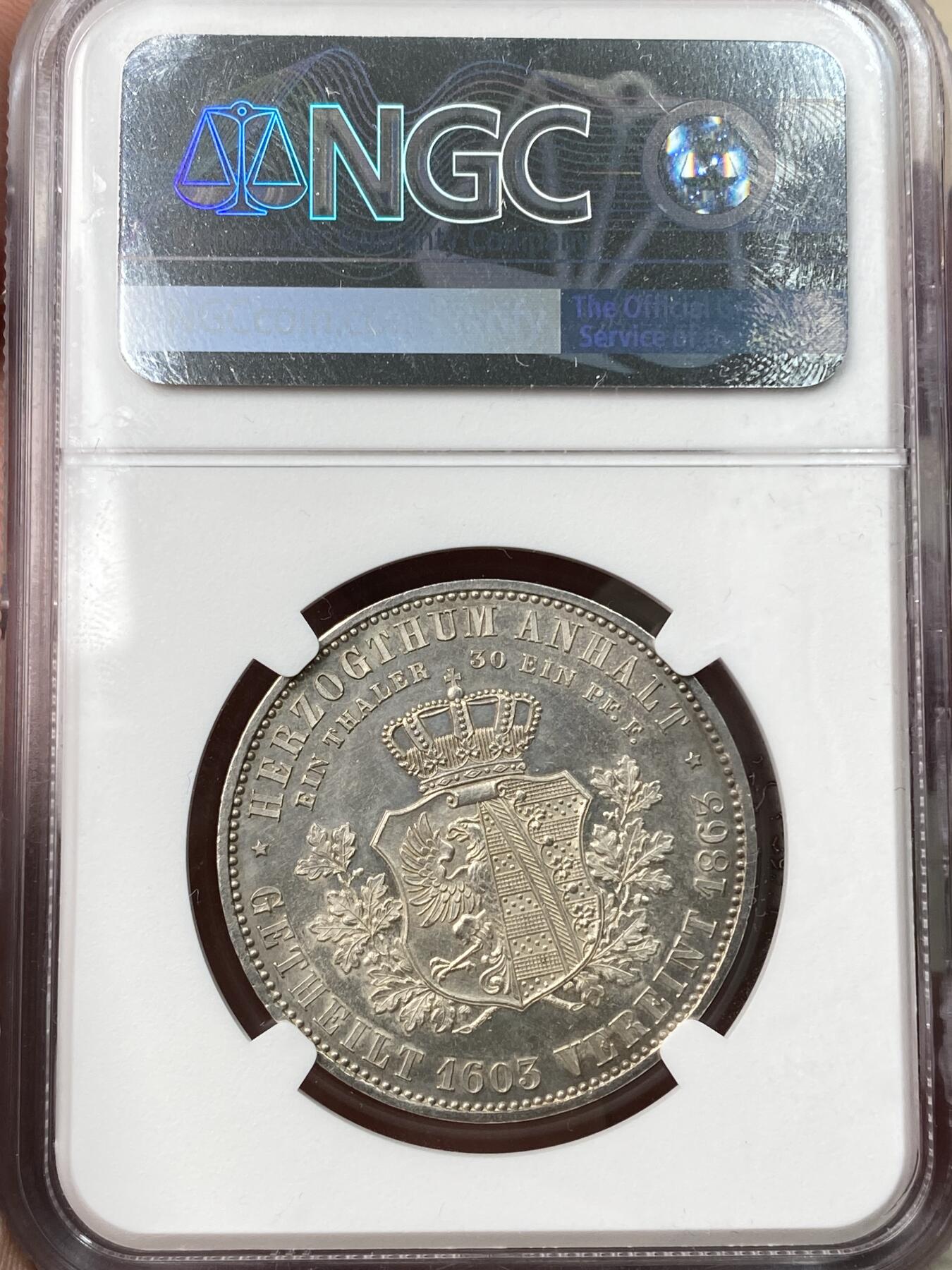 万国钱币拍卖第059期 NGC UNCD 1863年德国安哈特-德绍执政25周年盾徽1泰勒 经典小邦品种 原味淡彩高点上乘