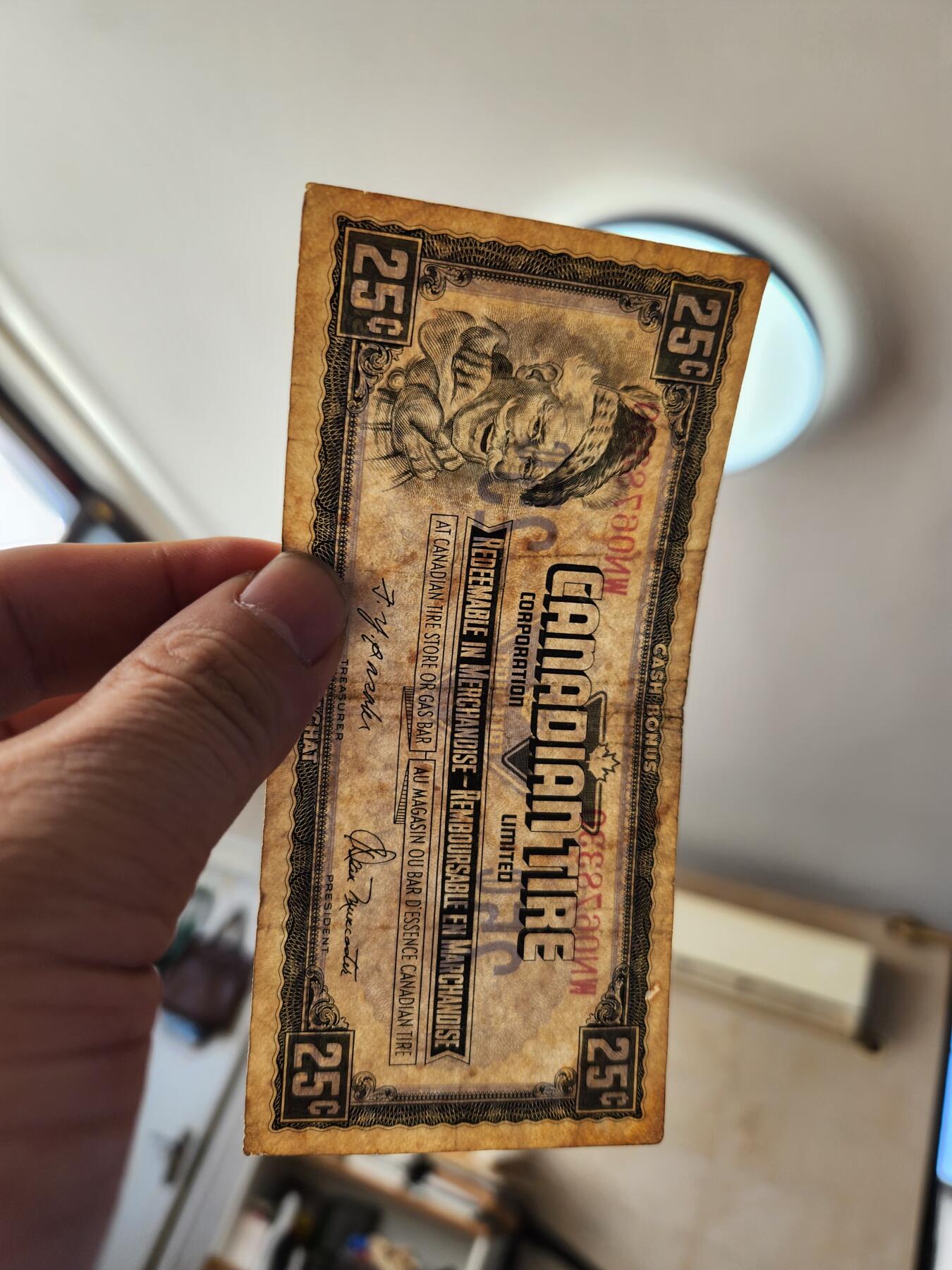 1月22号晚上8点 外国纸币自动截拍第11场 加拿大 轮胎公司代用币 25美分 原票旧品