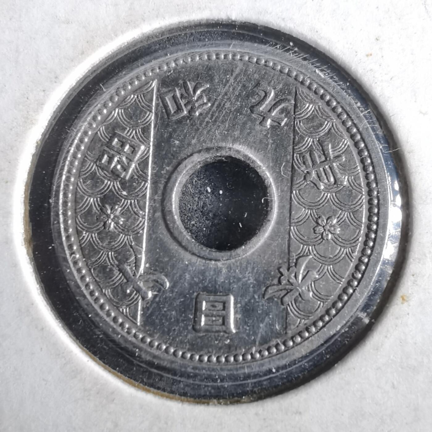 沼泽如烟--第972场 昭和九年十钱