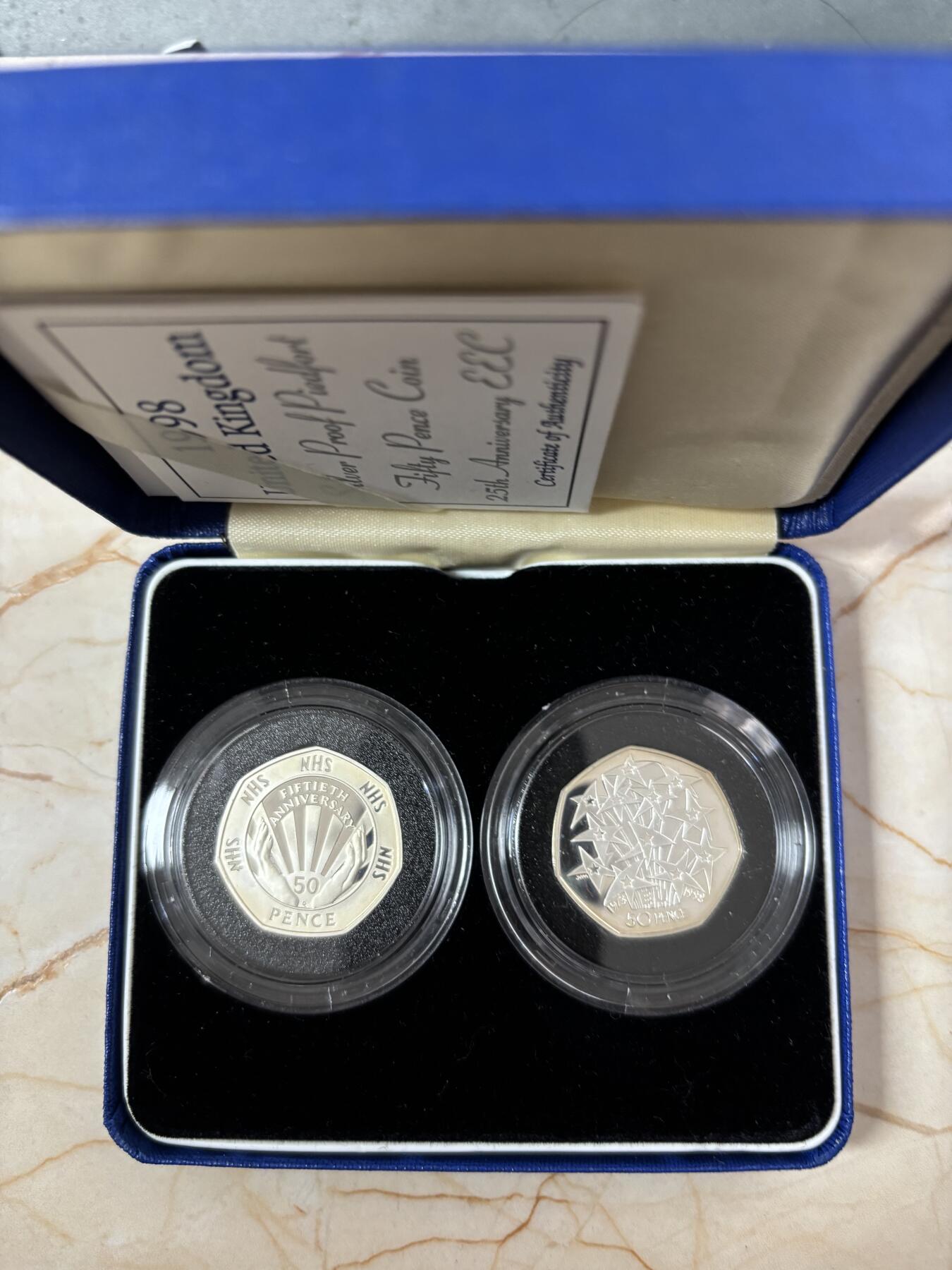 第189期拍卖 英国1998年欧共体和国家医疗50便士加厚银币一对，925银，16克*2，发行10000枚，有氧化