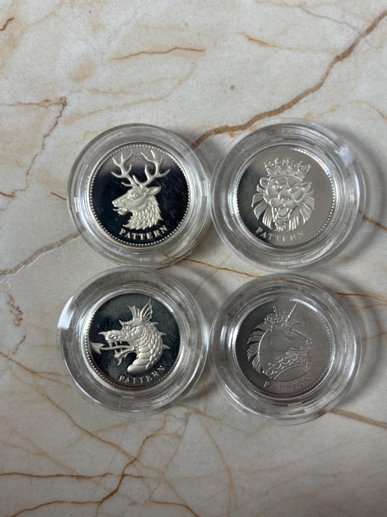 第189期拍卖 英国2004年皇室神兽1英镑精制纪念银币4枚全套，9.5克*4，发行5000套，有氧化