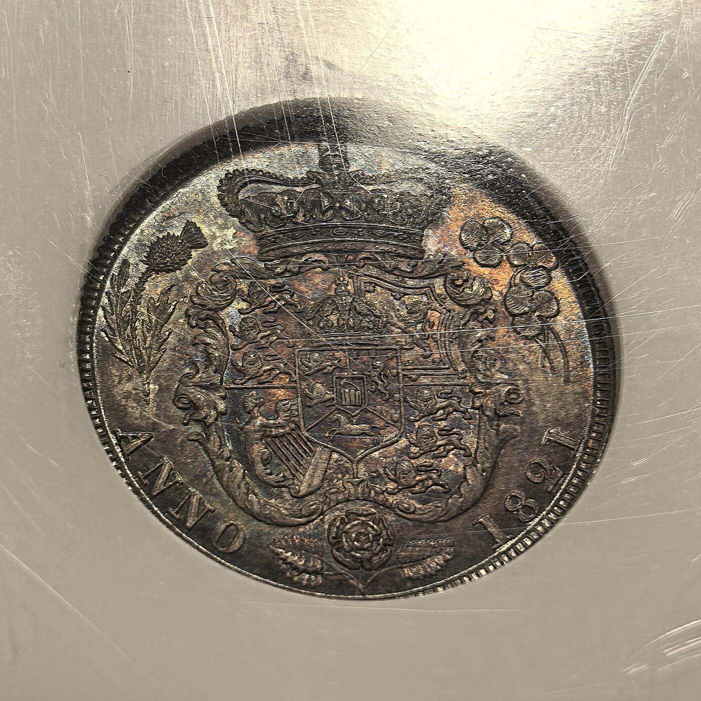 博洋堂世界钱币拍卖第158期（全场包邮） NGC MS65 英国1821年乔治三世1先令银币。极少见品种，高分相当难得。此枚顶级五彩包浆，底板几近无瑕，NGC老盒子加持，可以说是一步到位的一枚。AW此前64分曾有163170日元成交，此枚如此状态的65分值得高看一眼