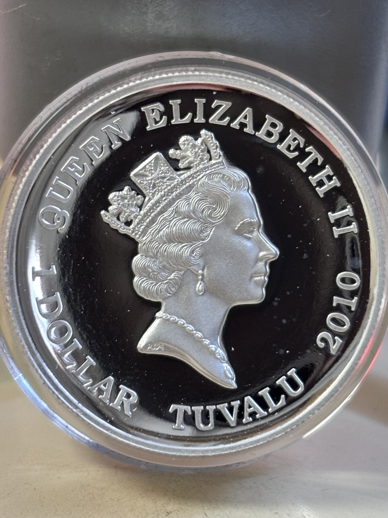 第189期拍卖 图瓦卢2010马拉松运动2500周年高浮雕加厚纪念银币，999银，1盎司，有白点