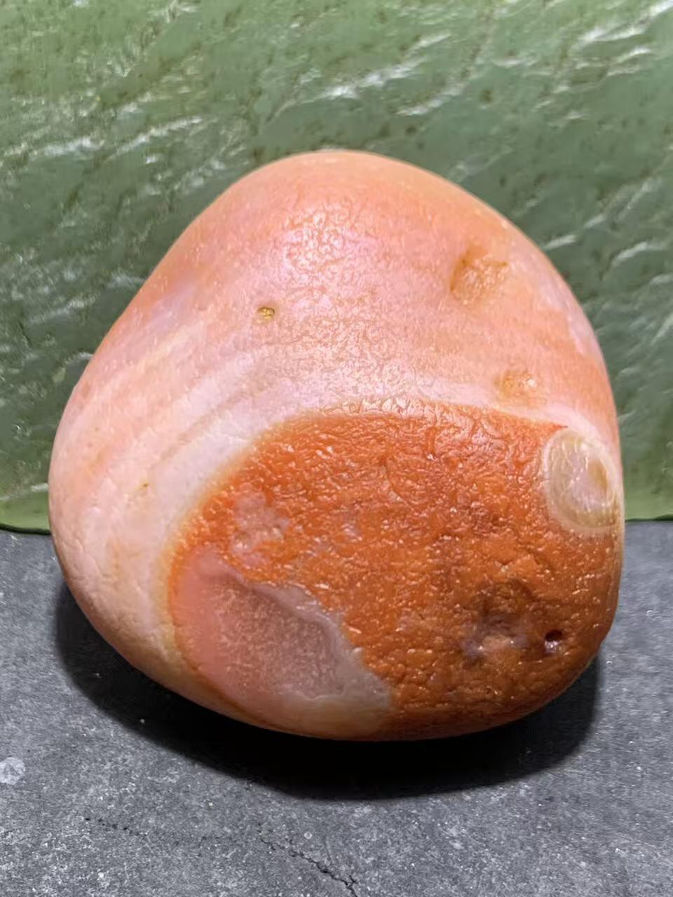 精美川料柿子红粉白水冲籽南红玛瑙原石一颗