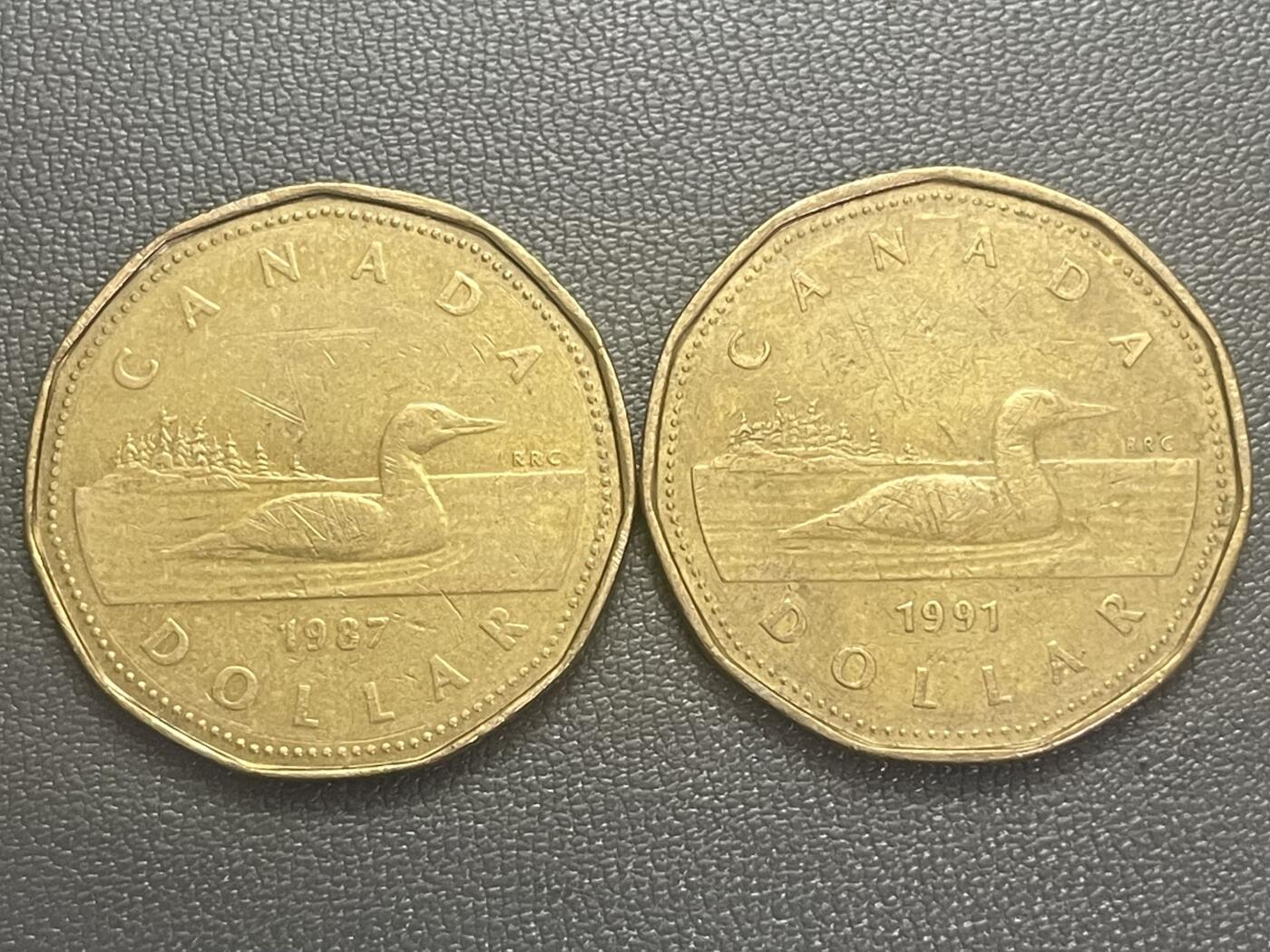 回流0125 加拿大1987、1991年1加元11边形青铜币两枚 潜鸟