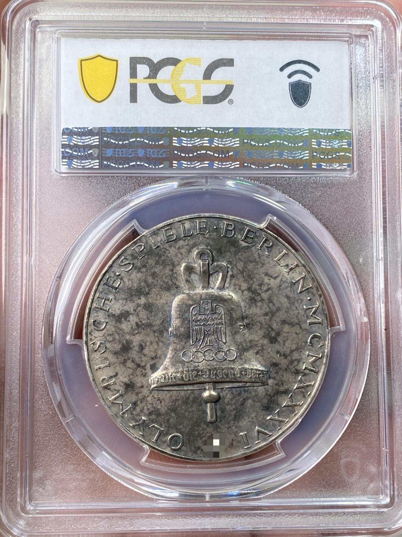 万国钱币拍卖第059期 PCGS UNCD 1936年德国柏林奥运会纪念银章 经典德三品种 原味黑彩（原图请私信后台或自行查询官网）