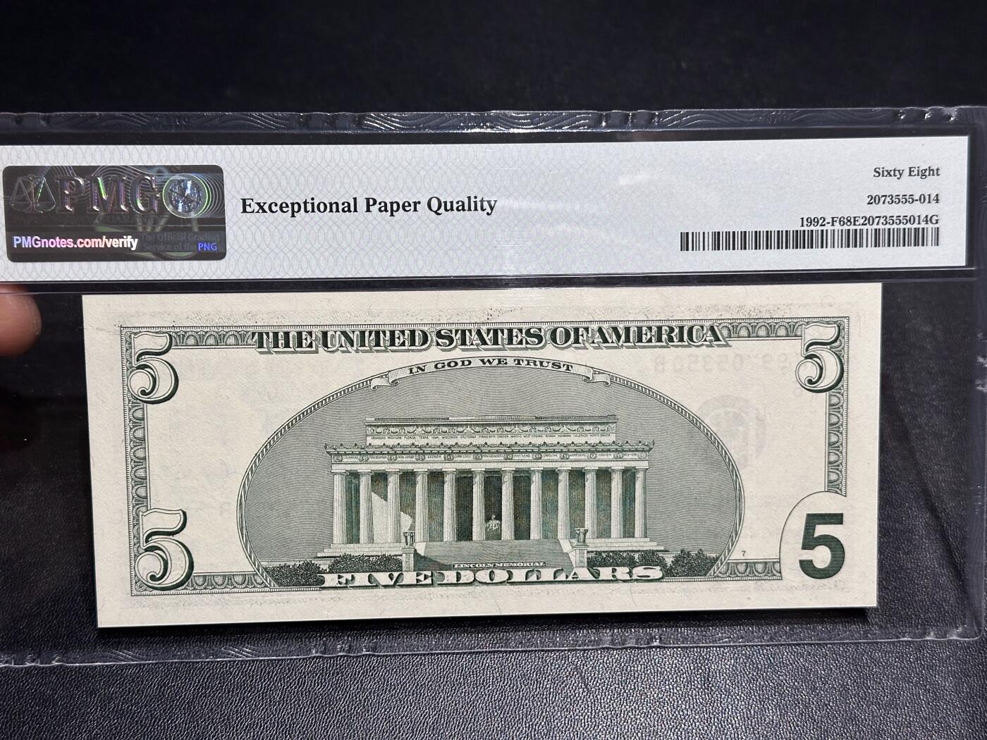 《外钞收藏家》第六百零四期（精品场）（本平台长期征集拍品、欢迎藏友们联系合作） 2006年美国大头版5美元 PMG68 无4高分