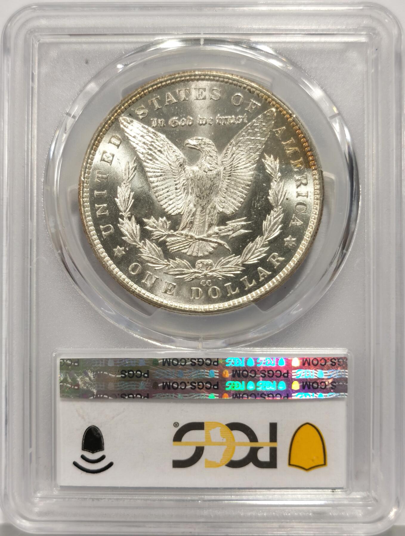 博洋堂世界钱币拍卖第158期（全场包邮） PCGS MS63 美国1883年CC版摩根大银币，稀少卡森厂，绚丽月牙彩虹包浆，背面卡槽有一小磕