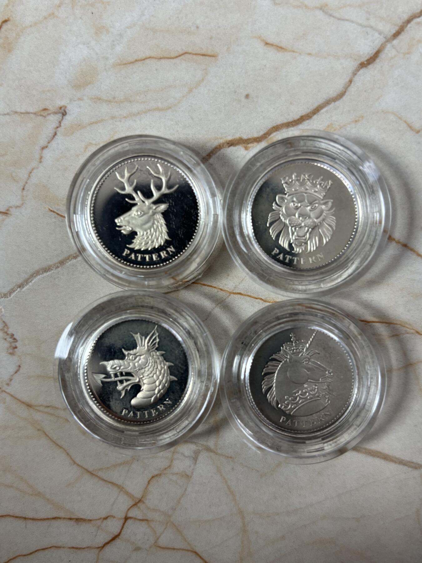 第189期拍卖 英国2004年皇室神兽1英镑精制纪念银币4枚全套，9.5克*4，发行5000套，有氧化