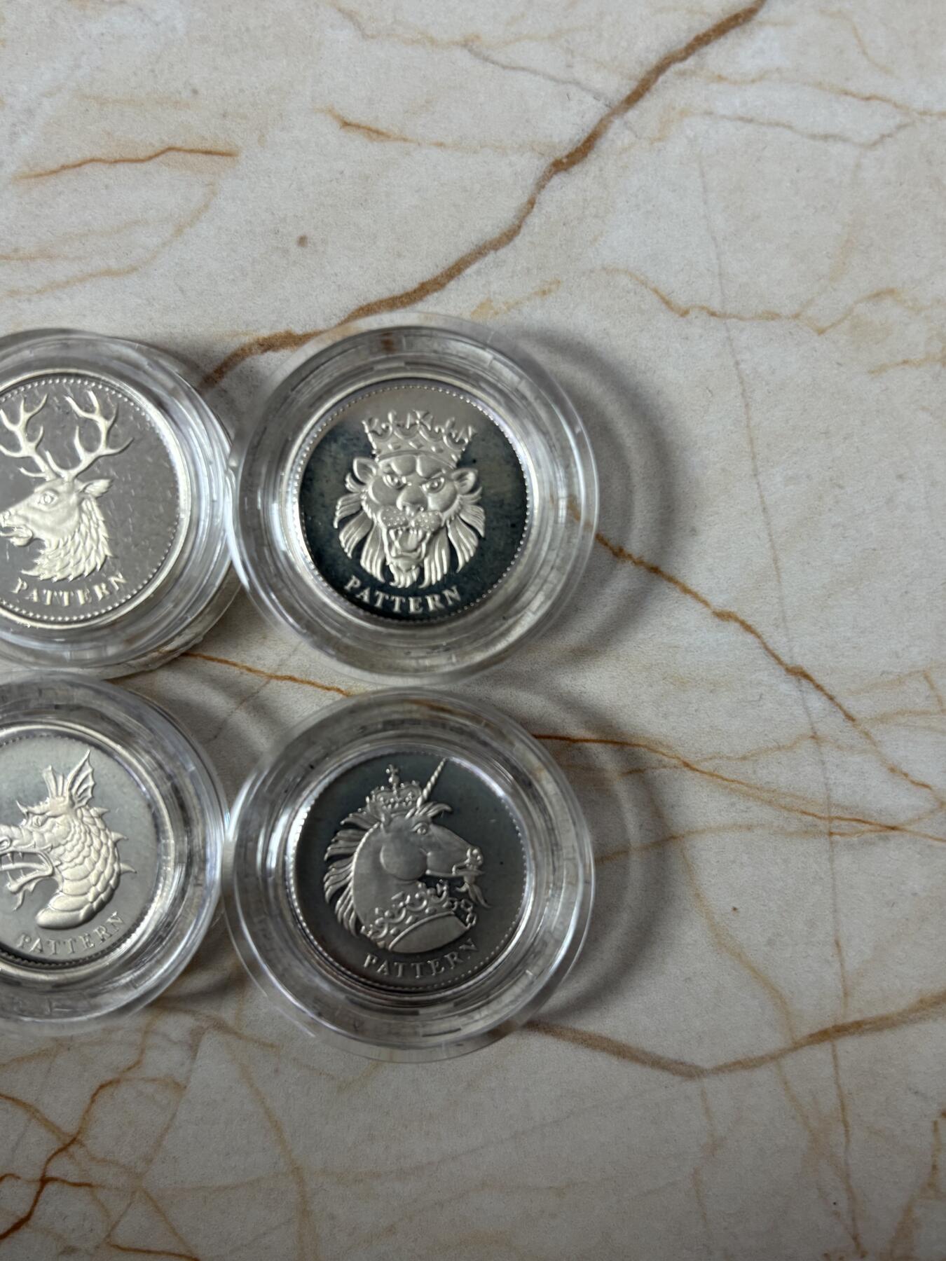 第189期拍卖 英国2004年皇室神兽1英镑精制纪念银币4枚全套，9.5克*4，发行5000套，有氧化