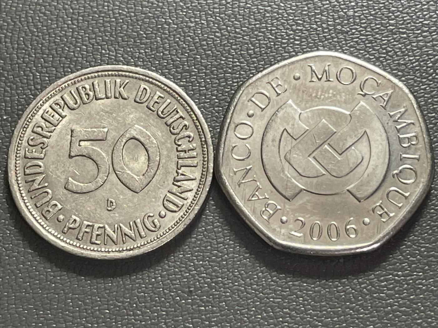 回流0125 两个美少女 联邦德国50芬尼、莫桑比克1 梅蒂卡尔