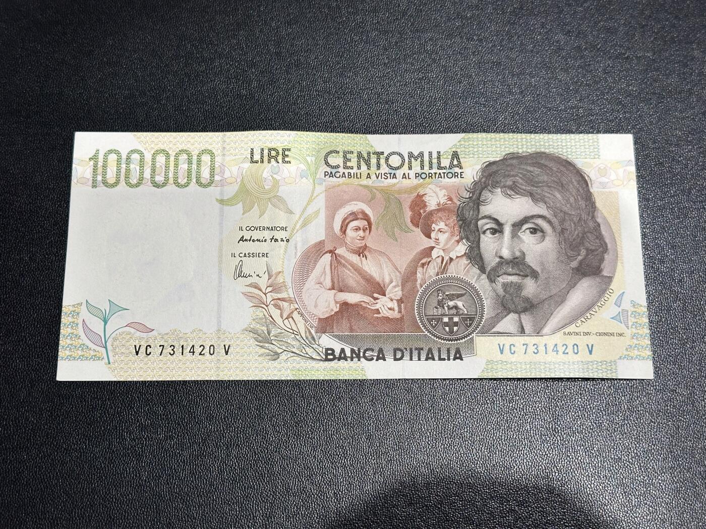 《外钞收藏家》第六百零四期（精品场）（本平台长期征集拍品、欢迎藏友们联系合作） 1994年意大利10万里拉 卡拉瓦乔 AU品相