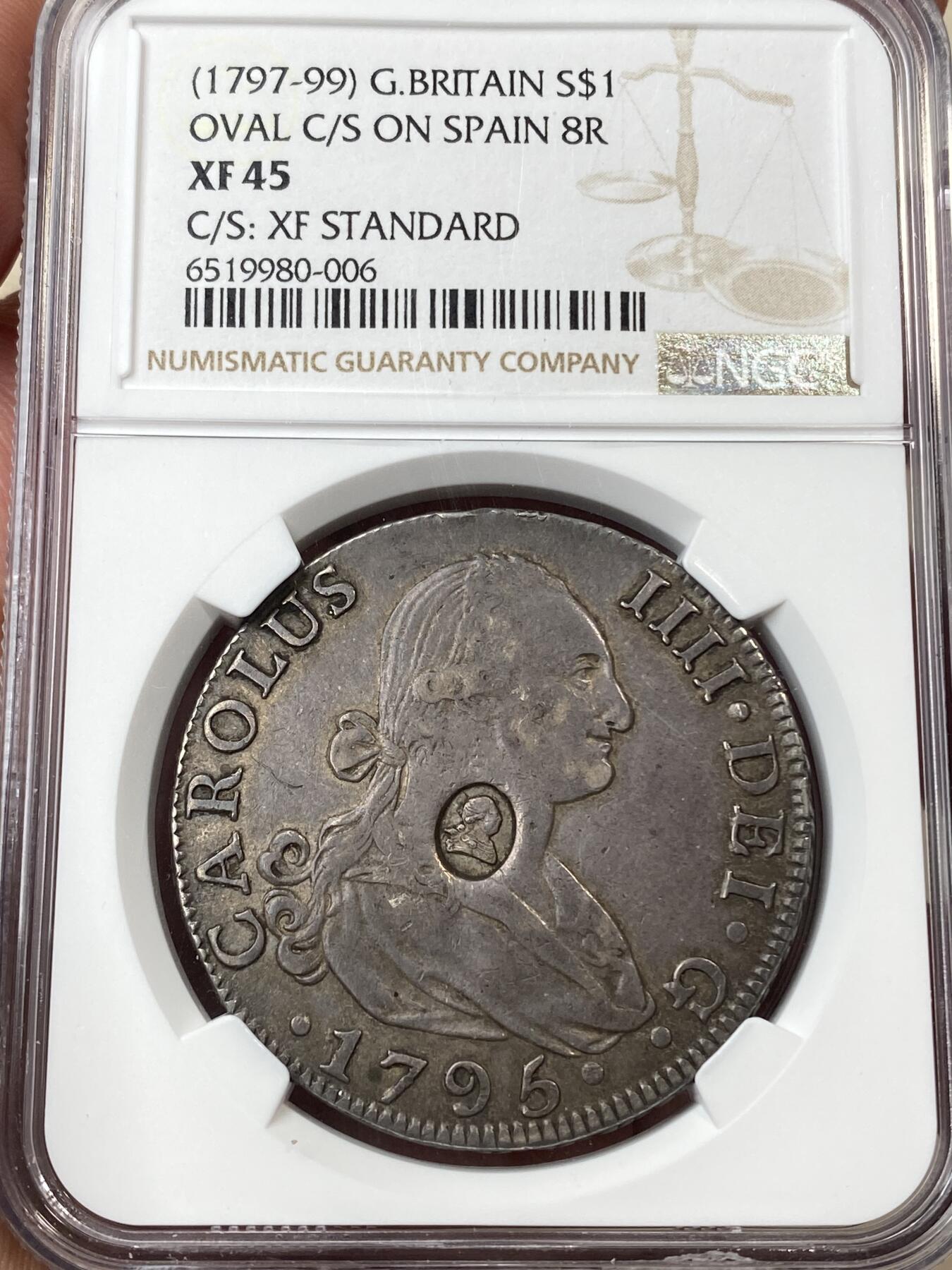 万国钱币拍卖第059期 NGC XF45 1797年英国乔治三世英格兰银行加盖一元银币 加盖在西班牙本土8R银币上 好品非常罕见的品种 一枚状态舒适的原味45已是入藏之选