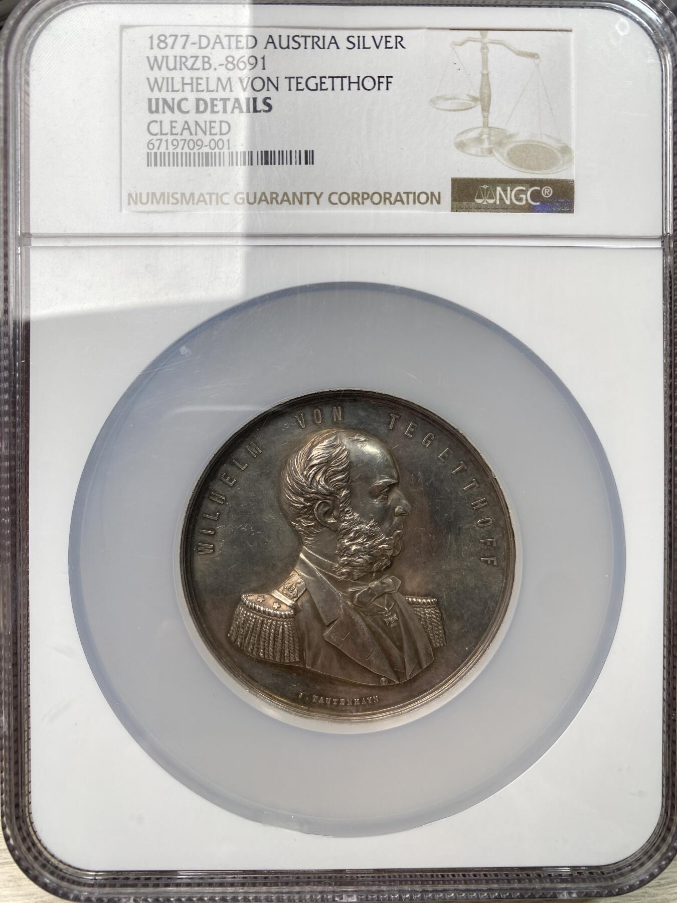 万国钱币拍卖第059期 NGC UNCD 1877年奥匈帝国海军中将威廉·特格特霍夫男爵纪念大银章 以表彰其英勇奋战于赫尔戈兰 并在里萨荣耀取胜 为自身及奥匈海军赢得不朽荣耀 62MM 70.45G