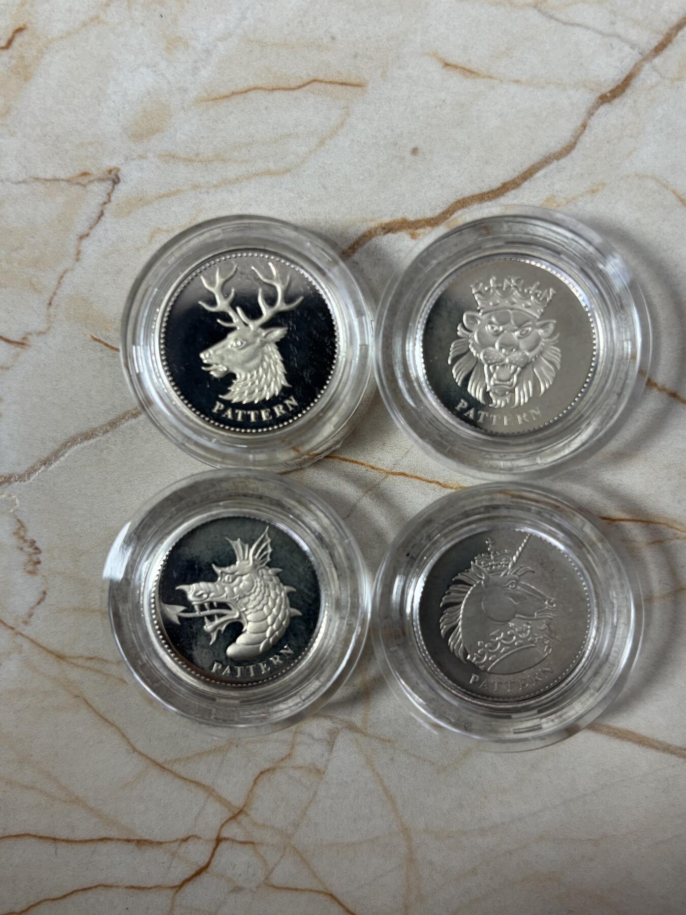 第189期拍卖 英国2004年皇室神兽1英镑精制纪念银币4枚全套，9.5克*4，发行5000套，有氧化