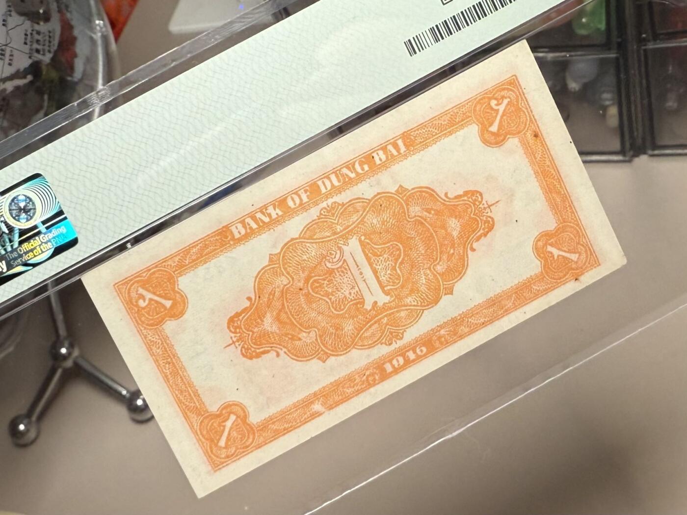 （自动截拍）PMG评级民国纸币专拍第20260127期，全场包邮 【乾奕收藏】出1946年民国35年东北银行辽东地名壹圆，美国PMG40分，热门区票品种
