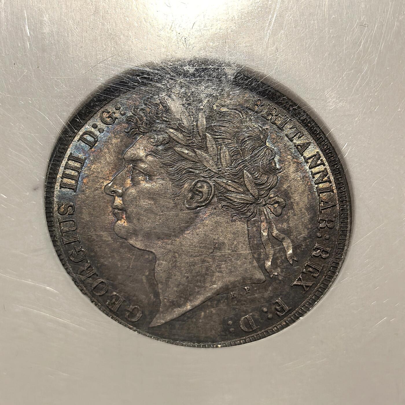 博洋堂世界钱币拍卖第158期（全场包邮） NGC MS65 英国1821年乔治三世1先令银币。极少见品种，高分相当难得。此枚顶级五彩包浆，底板几近无瑕，NGC老盒子加持，可以说是一步到位的一枚。AW此前64分曾有163170日元成交，此枚如此状态的65分值得高看一眼