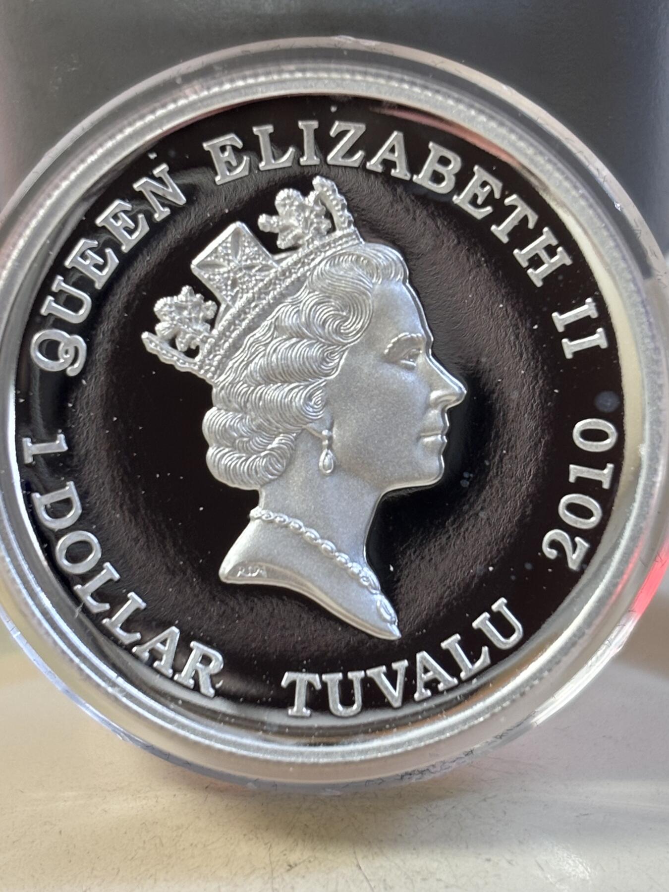 第189期拍卖 图瓦卢2010马拉松运动2500周年高浮雕加厚纪念银币，999银，1盎司，有白点