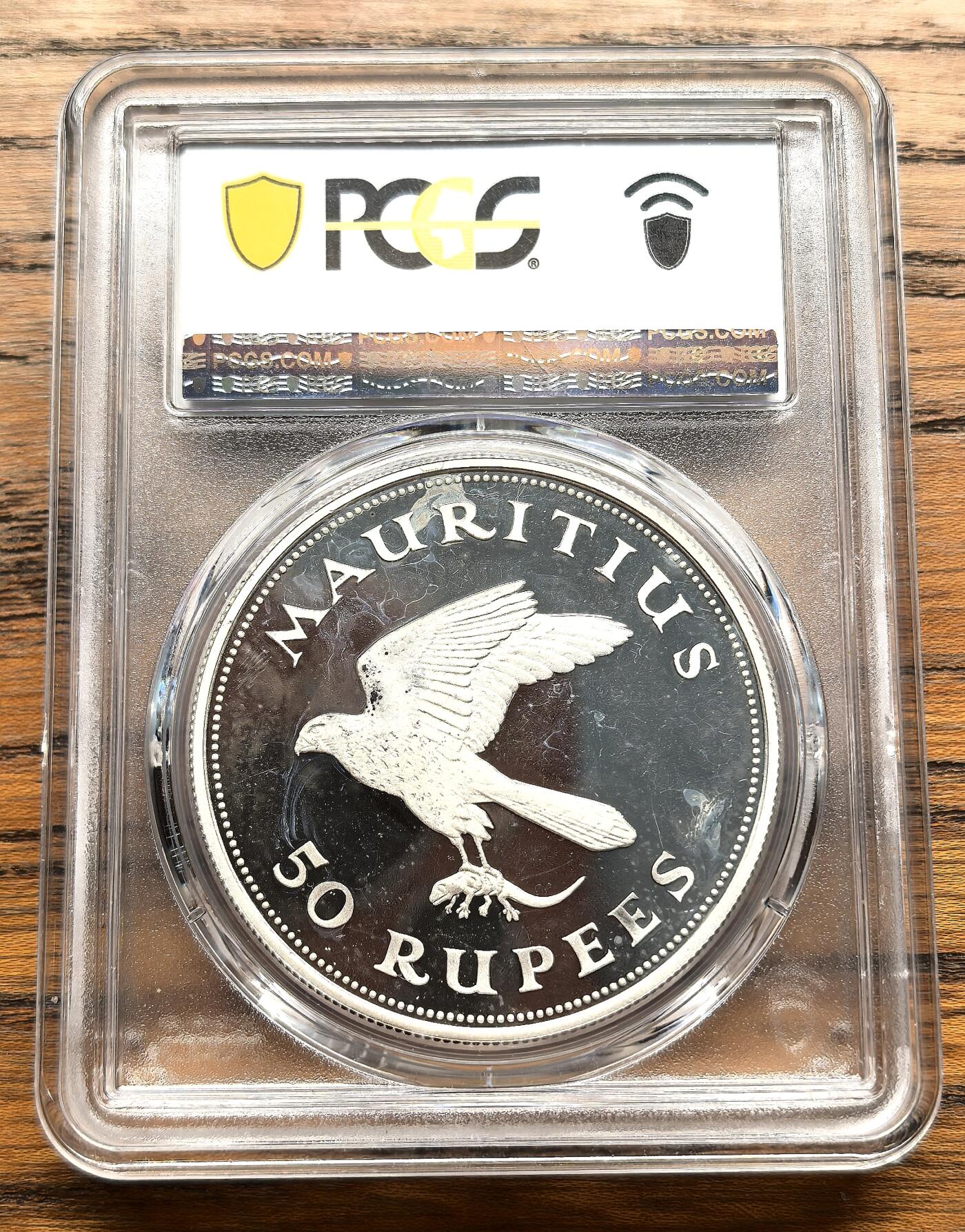 凡希社世界钱币微拍第三百十九期 1975毛里求斯隼抓蜥蜴50卢比大银精铸PCGS-PR67DCAM
