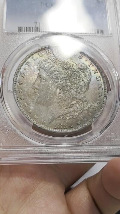 博洋堂世界钱币拍卖第158期（全场包邮） PCGS MS65 美国1884年O版摩根大银币，底板超级五彩，收藏级的一枚