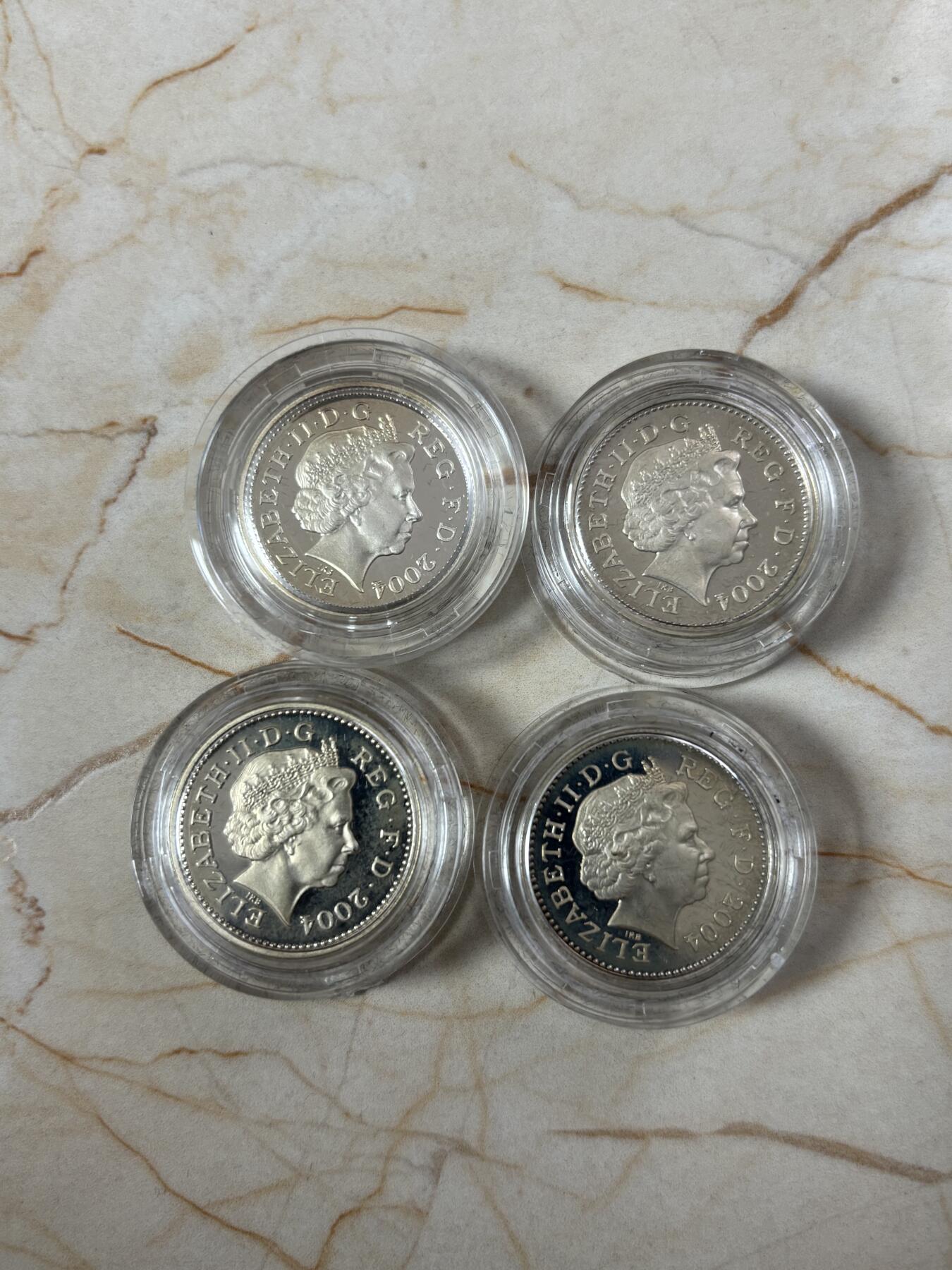 第189期拍卖 英国2004年皇室神兽1英镑精制纪念银币4枚全套，9.5克*4，发行5000套，有氧化