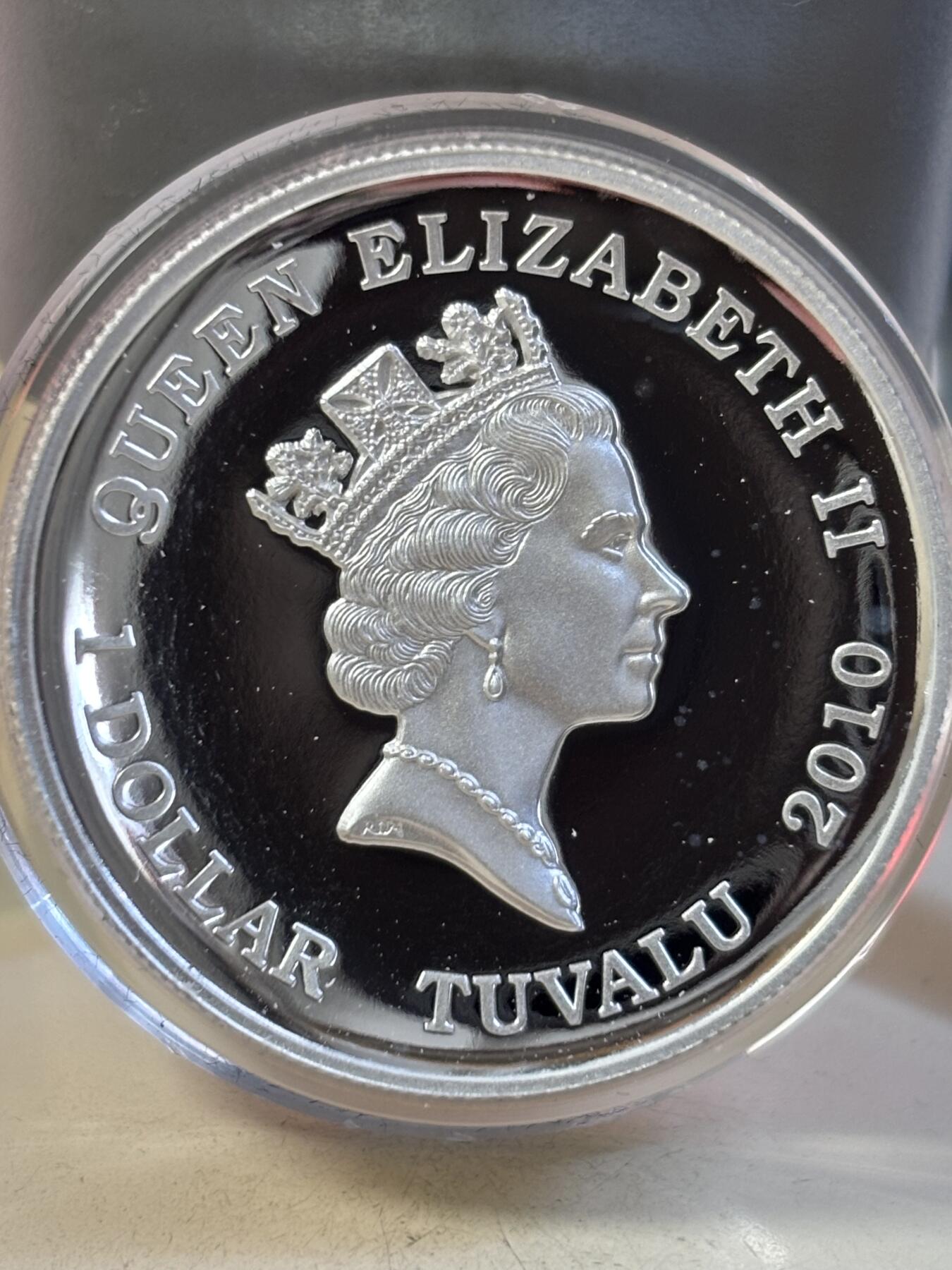 第189期拍卖 图瓦卢2010马拉松运动2500周年高浮雕加厚纪念银币，999银，1盎司，有白点