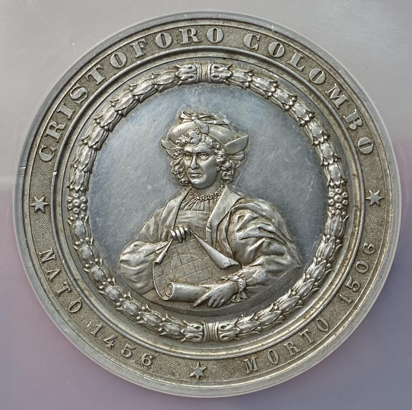 万国钱币拍卖第059期 NGC MS62 1892年意大利世界博览会哥伦布纪念大合金章 正面哥伦布手持航海地图 精制镜面高浮雕 50MM大规格