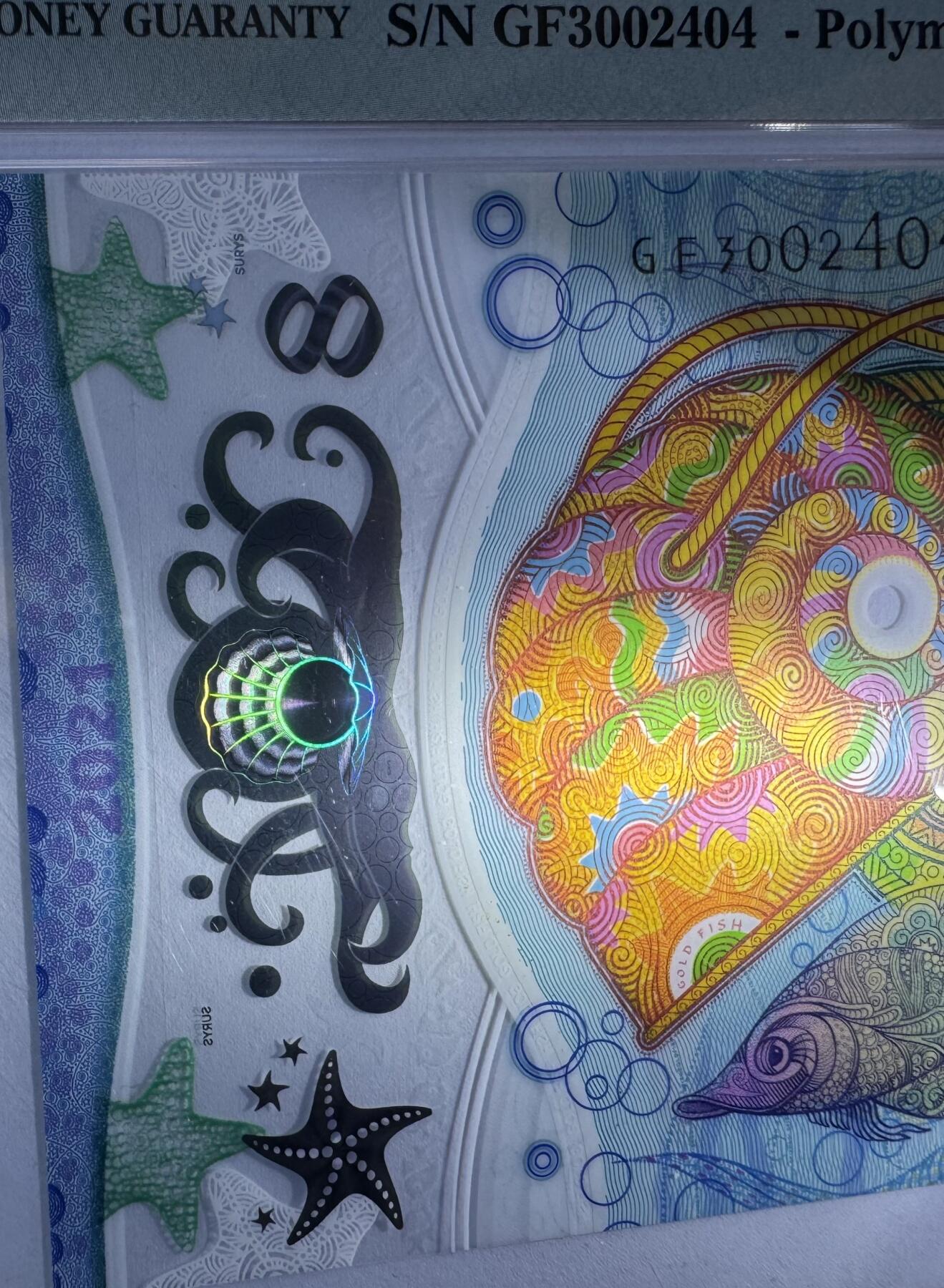 2026第2场（总第229期）：精品测试钞、连体钞综合场 哈萨克斯坦KAZ“金鱼”Plasmogram™ Reverso箔条纹技术塑料测试钞（PMG68高分）