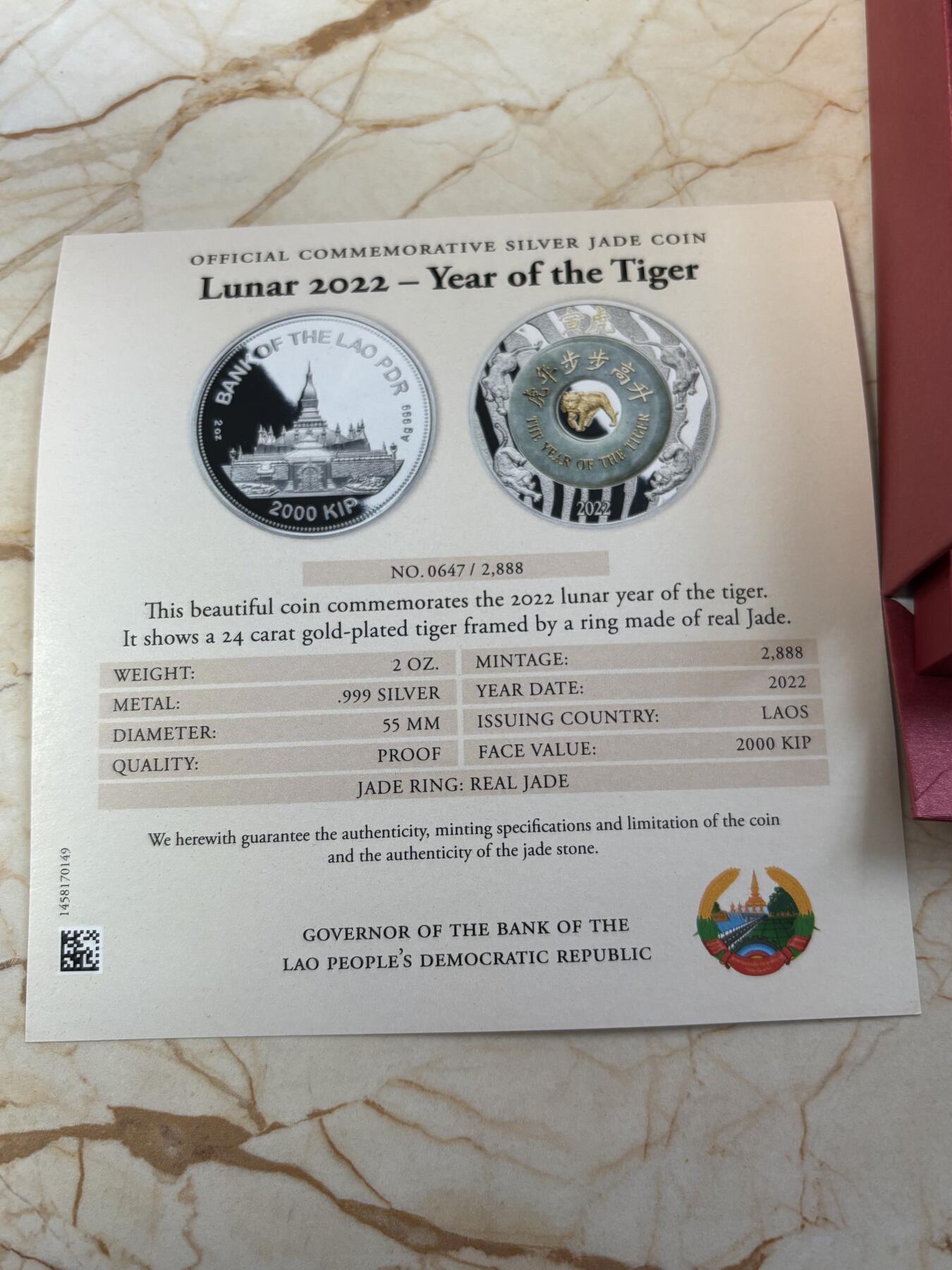 第189期拍卖 老挝2022年中国生肖系列虎年2盎司镶金玉纪念银币，999银，发行2888枚